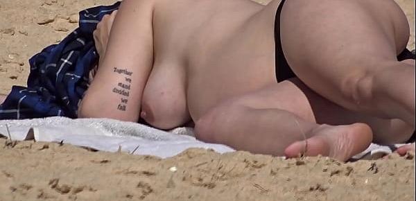 Beautiful busty pregnant topless at the beach